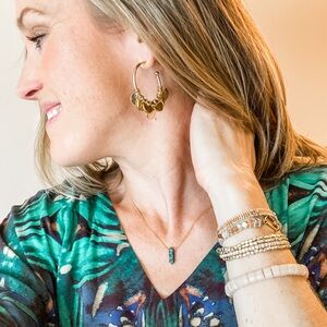 Karibu hoops from Fall 2023 collection, hand made in Kenya from recycled brass